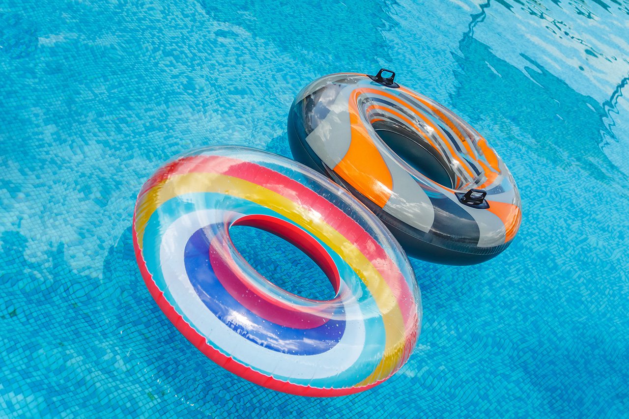 Inflatable-water-activities-circles-tuba-float-on-the-water-in-the-pool.